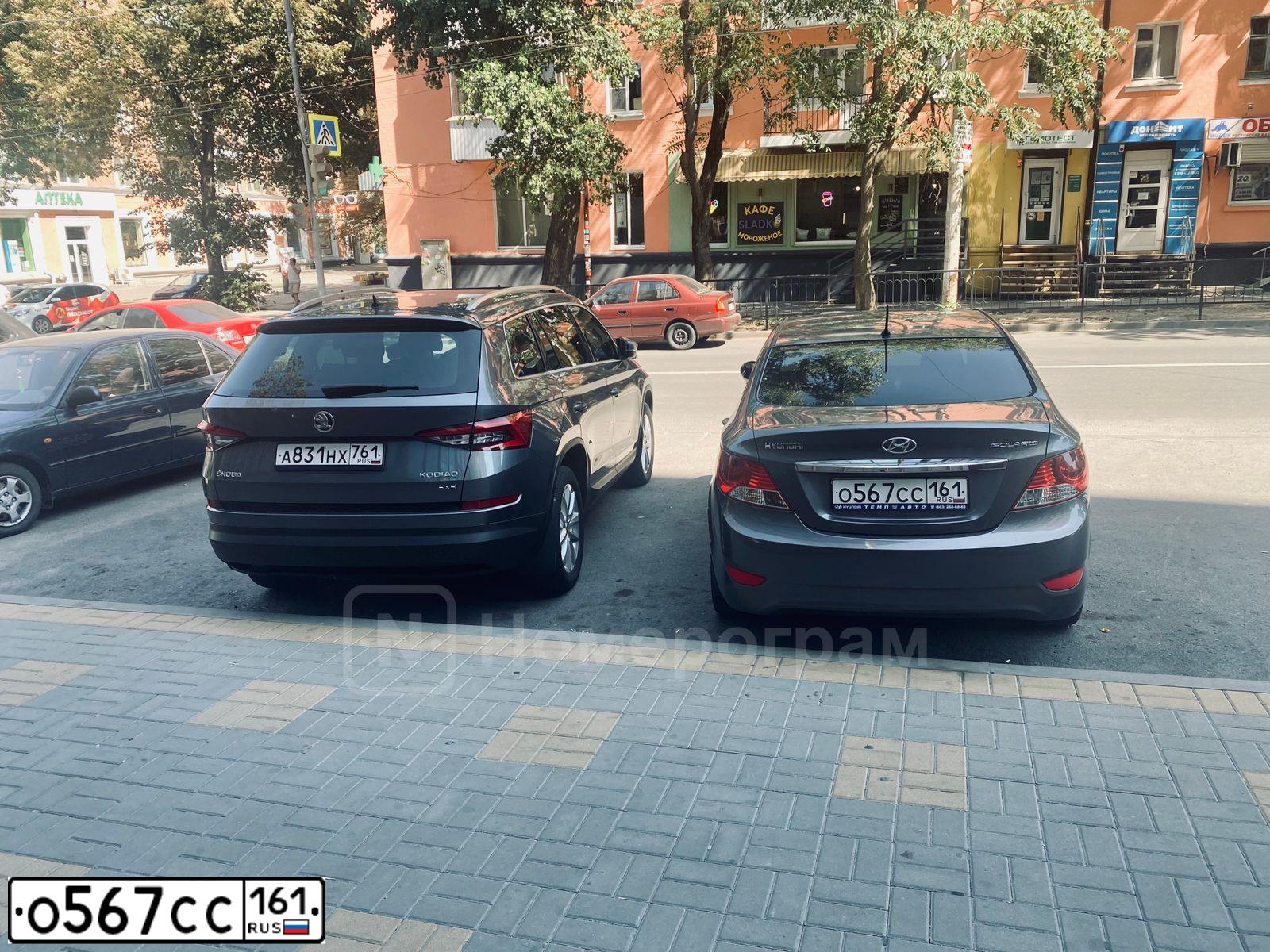 Фото автомобиля HYUNDAI SOLARIS, 2013 — госномер О567СС161. Цвет: ЧЕРНЫЙ СЕРЫЙ