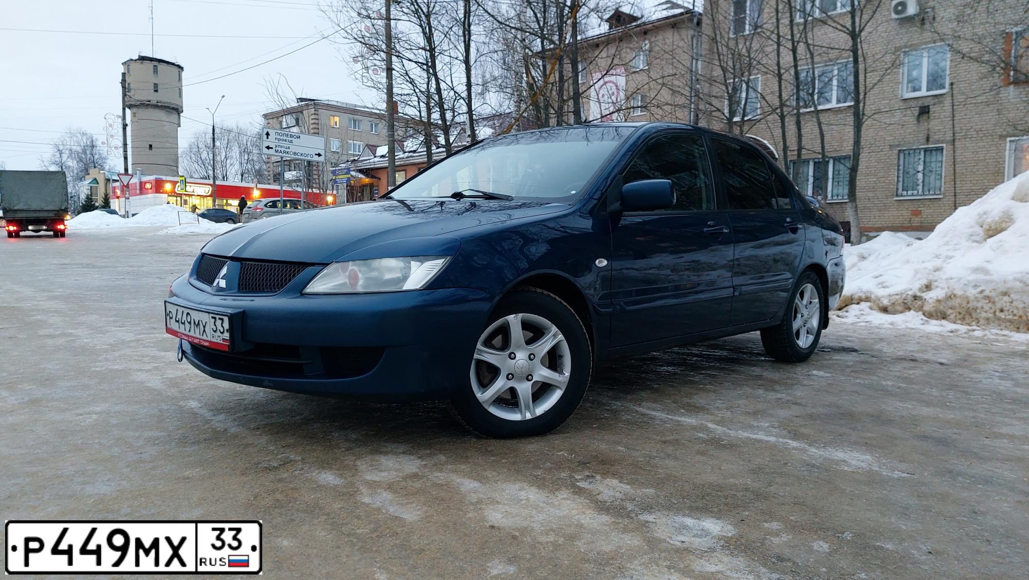 Фото автомобиля MITSUBISHI LANCER, 2006 — госномер В084ОУ37. Цвет: синий