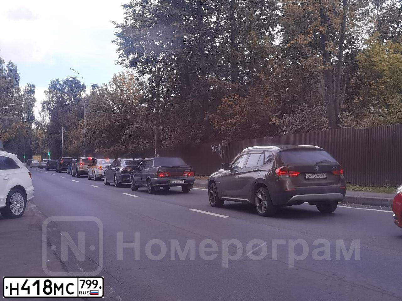 Фото автомобиля BMW X1, 2011 — госномер Х970НВ790. Цвет: Коричневый