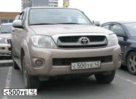 Фото автомобиля TOYOTA HILUX, 2011 — госномер Н295МО142. Цвет: ЗОЛОТИСТЫЙ