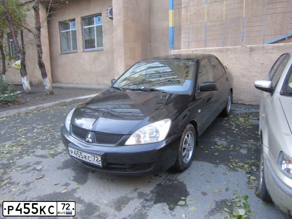 Фото автомобиля MITSUBISHI LANCER, 2006 — госномер Р455КС72. Цвет: ЧЕРНЫЙ