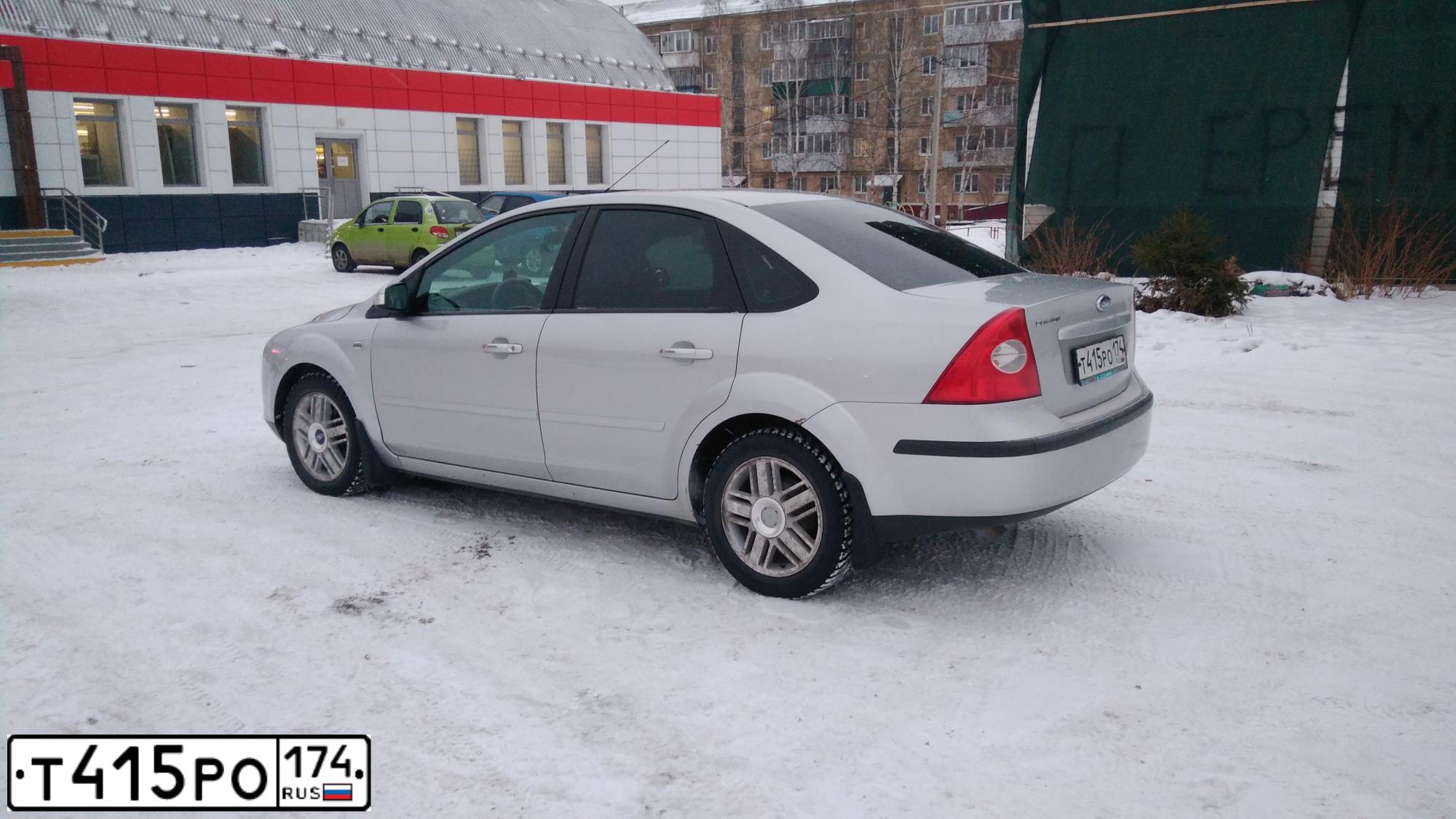 Фото автомобиля FORD FOCUS, 2008 — госномер Р756ЕА774. Цвет: Серебристый