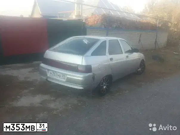 Фото автомобиля LADA 2112 LADA, 2004 — госномер М353МВ31. Цвет: СВЕТЛО-СЕРЕБРИСТЫЙ