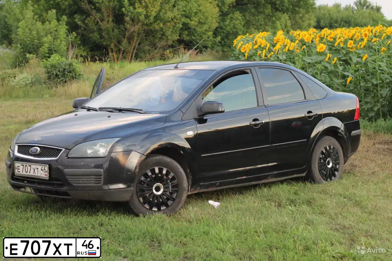 Фото автомобиля FORD FOCUS, 2006 — госномер Е707ХТ46. Цвет: ЧЕРНЫЙ