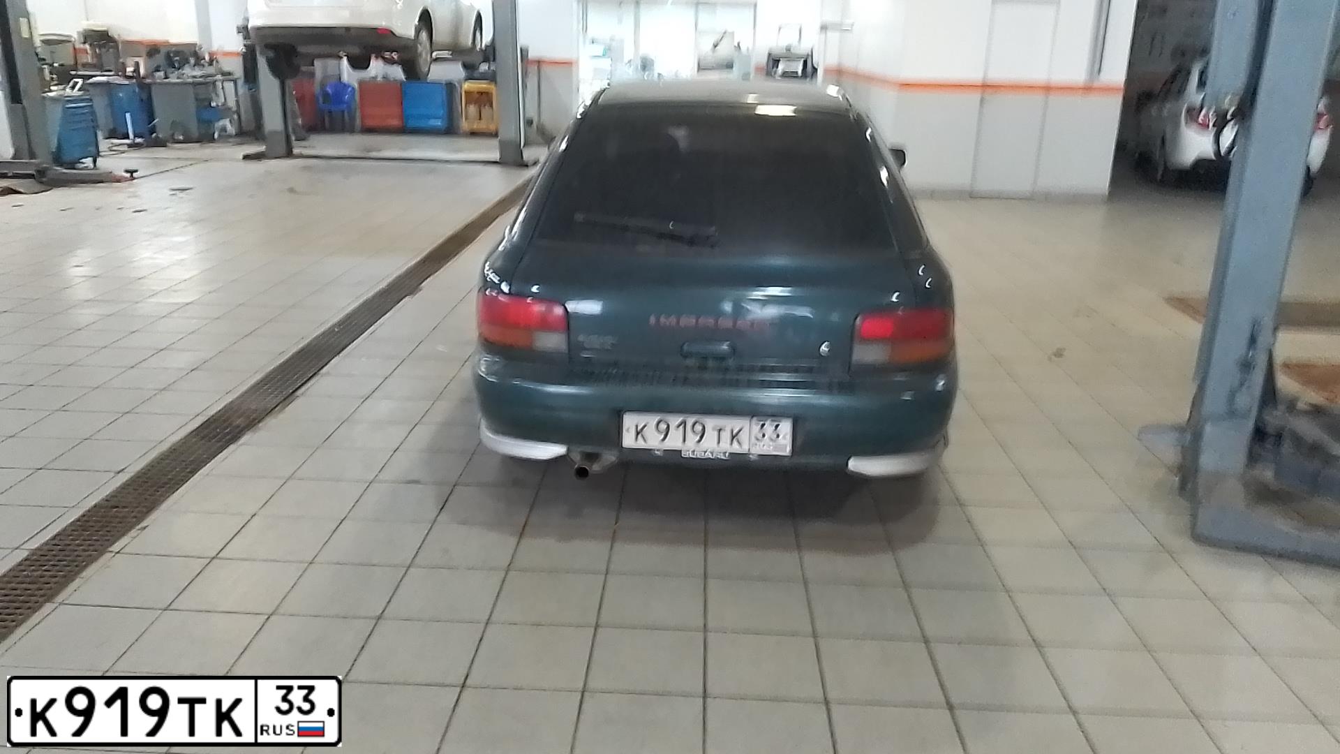 Фото автомобиля SUBARU IMPREZA, 1995 — госномер А150ЕЕ252. Цвет: ЗЕЛЕНЫЙ