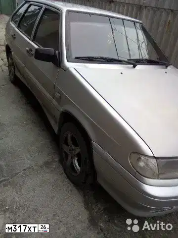 Фото автомобиля LADA 2114 SAMARA, 2004 — госномер Е573СК90. Цвет: СВЕТЛО СЕРЕБРИСТЫЙ МЕТАЛЛ
