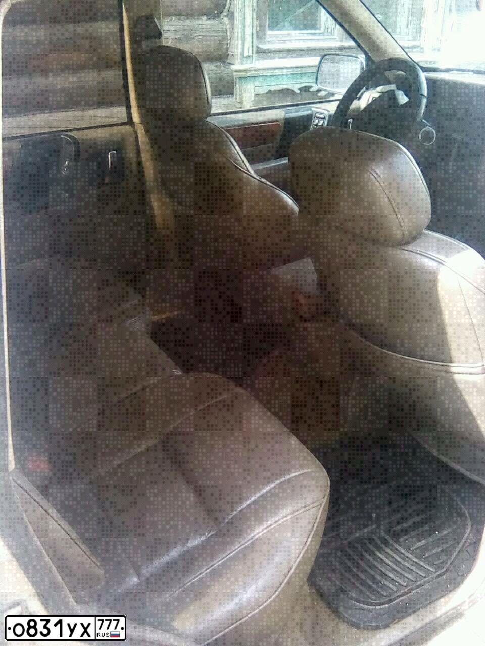 Фото автомобиля JEEP GRAND CHEROKEE, 1993 — госномер М650ХХ13. Цвет: Белый