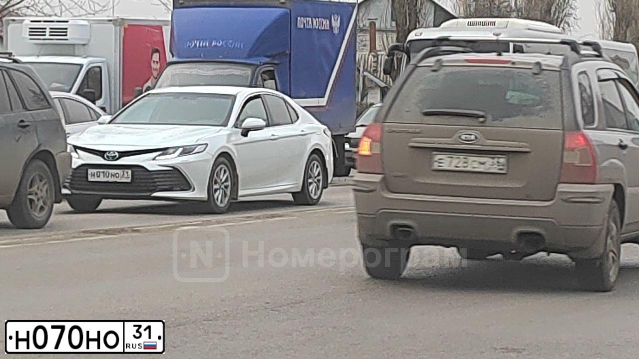 Фото автомобиля VOLKSWAGEN TIGUAN, 2013 — госномер Н070НО31. Цвет: БЕЛЫЙ