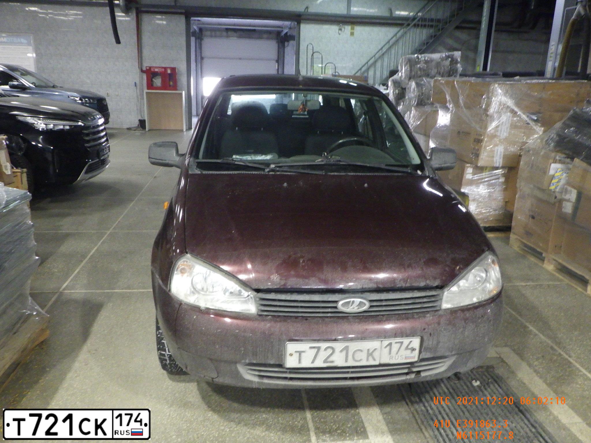 Фото автомобиля LADA 1117 KALINA, 2013 — госномер Т721СК174. Цвет: ТЕМНО-ВИШНЕВЫЙ