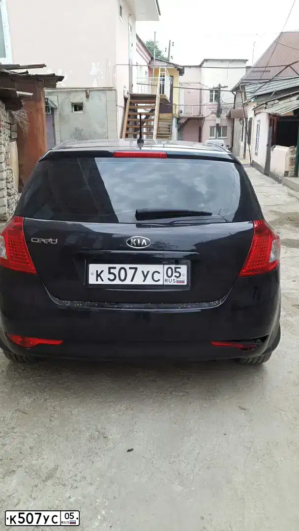 Фото автомобиля KIA CEE'D, 2010 — госномер С548ЕВ193. Цвет: ЧЕРНЫЙ ПЕРЛАМУТР