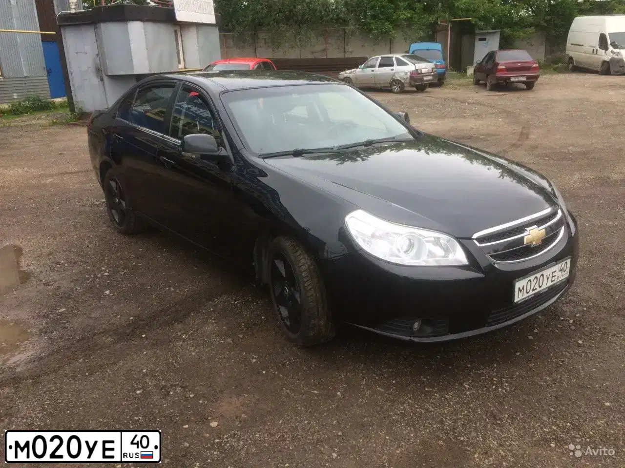 Фото автомобиля CHEVROLET EPICA, 2012 — госномер М020УЕ40. Цвет: ЧЕРНЫЙ