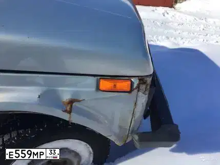 Фото автомобиля LADA 2131 NIVA, 2006 — госномер Е559МР33. Цвет: СЕРО-ГОЛУБОЙ