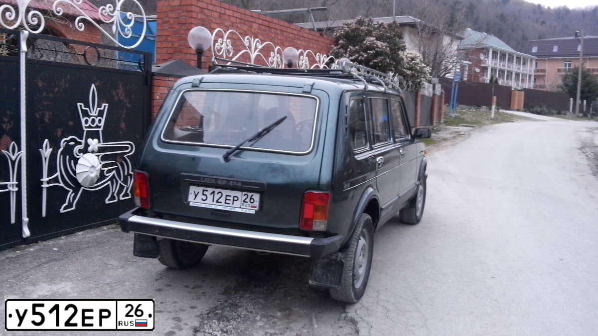 Фото автомобиля LADA 213100 LADA 4X4, 2009 — госномер М970КО82. Цвет: СЕРО-СИНЕ-ЗЕЛЕНЫЙ