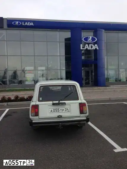 Фото автомобиля VAZ 2104 LADA, 1996 — госномер А055ТР24. Цвет: БЕЛЫЙ