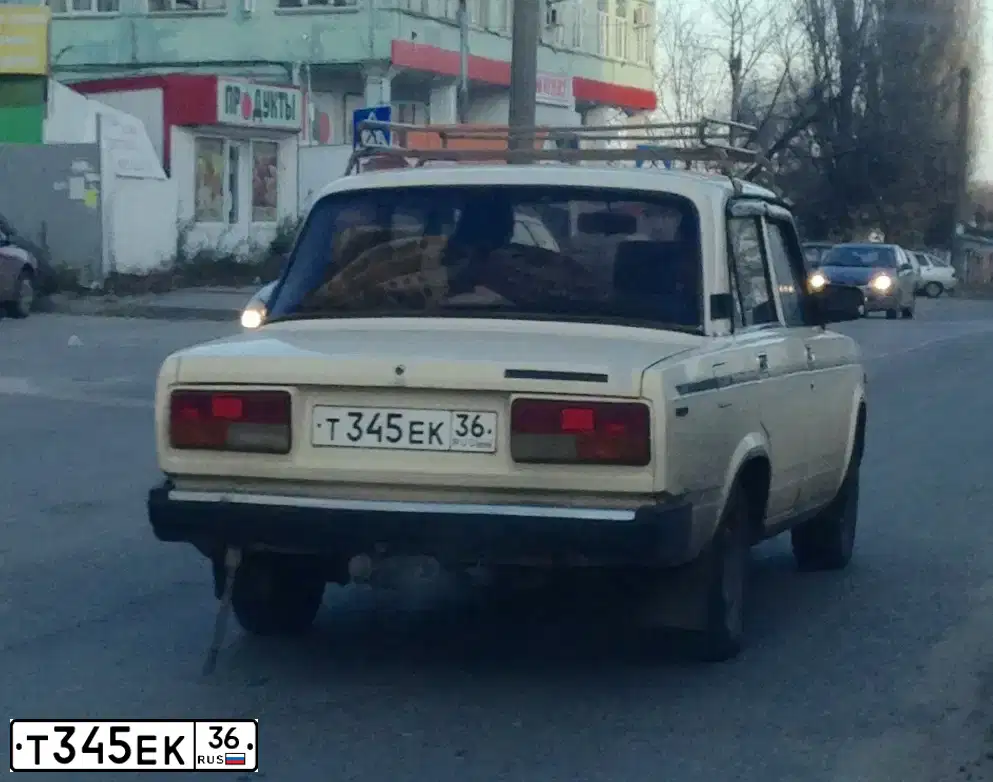 Фото автомобиля LADA 2107, 1998 — госномер Т345ЕК36. Цвет: СВЕТЛО-ЖЕЛТЫЙ