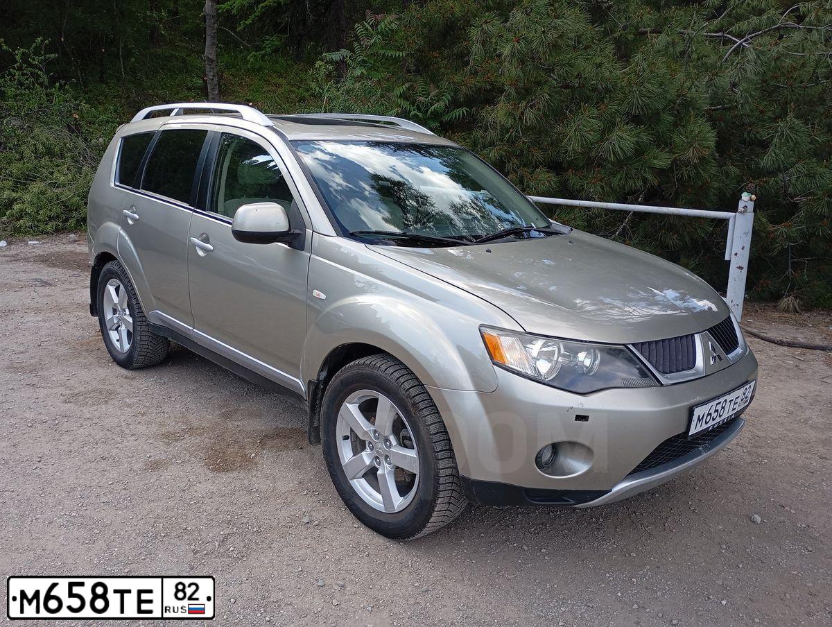 Фото автомобиля MITSUBISHI МИЦУБИСИ АУТЛЕНДЕР 2.4, 2008 — госномер М658ТЕ82. Цвет: БЕЖЕВЫЙ