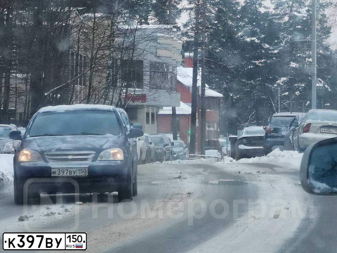 Фото автомобиля CHEVROLET LACETTI, 2006 — госномер К397ВУ150. Цвет: СИНИЙ