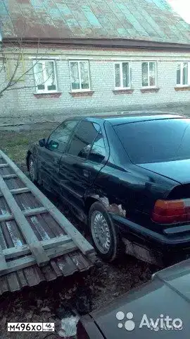 Фото автомобиля BMW W SERIE 3, 1992 — госномер Н352АК57. Цвет: ЧЕРНЫЙ
