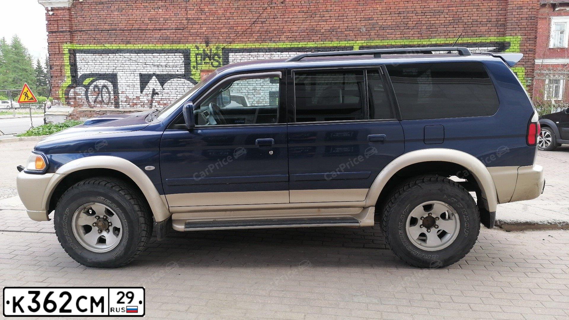 Фото автомобиля MITSUBISHI PAJERO SPORT, 2007 — госномер О277ОТ29. Цвет: СИНИЙ СЕРЫЙ