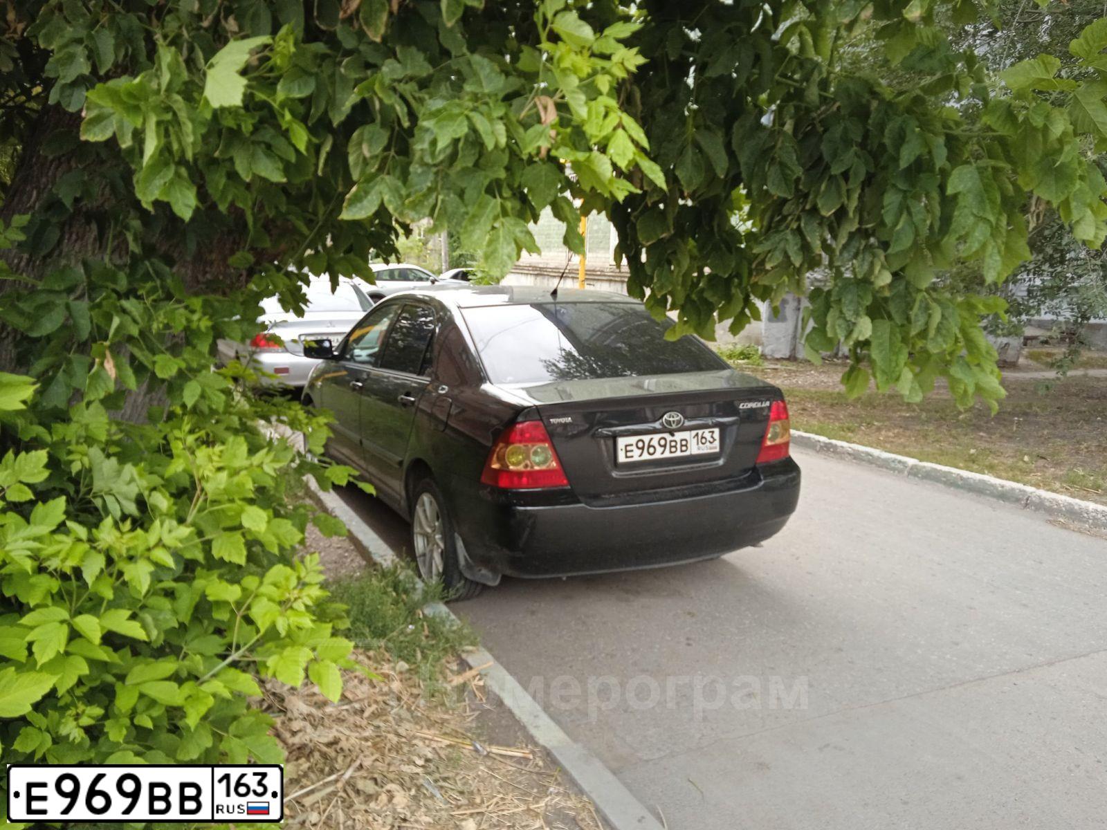 Фото автомобиля TOYOTA COROLLA, 2006 — госномер Е969ВВ163. Цвет: ЧЕРНЫЙ