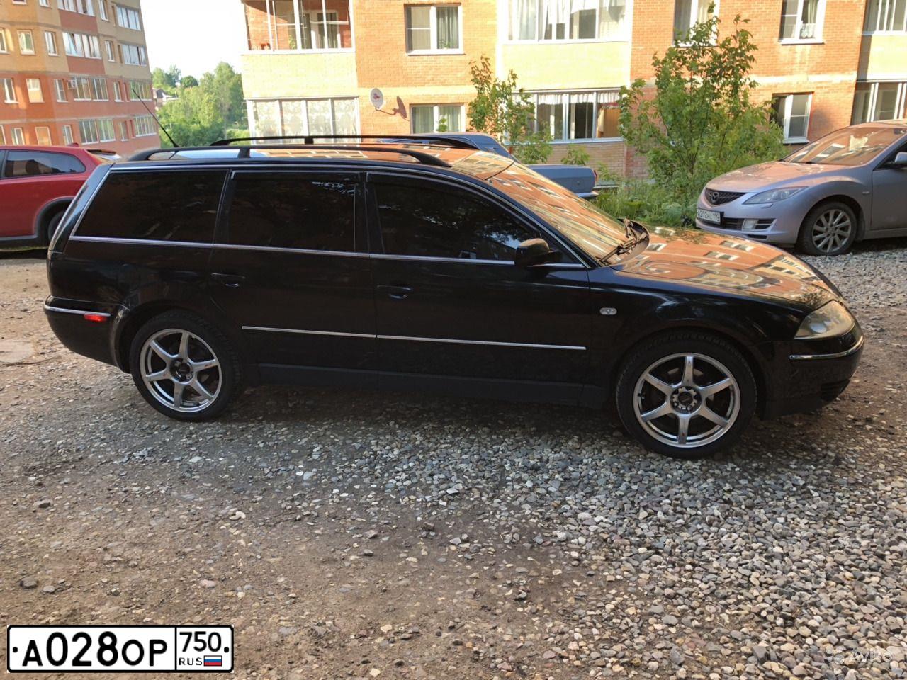 Фото автомобиля VOLKSWAGEN PASSAT, 2002 — госномер А028ОР750. Цвет: ЧЕРНЫЙ