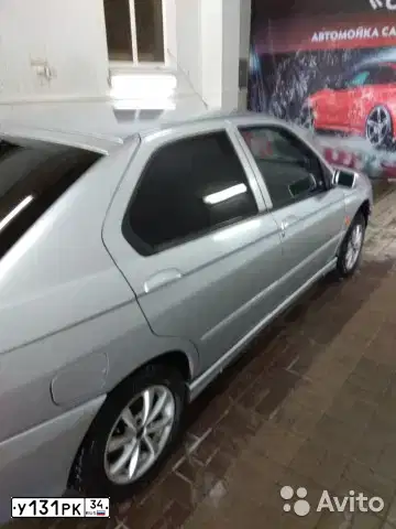 Фото автомобиля LADA 2111 LADA, 2006 — госномер Е817ТМ134. Цвет: СРЕДНИЙ СЕРО-ЗЕЛЕНЫЙ МЕТ.