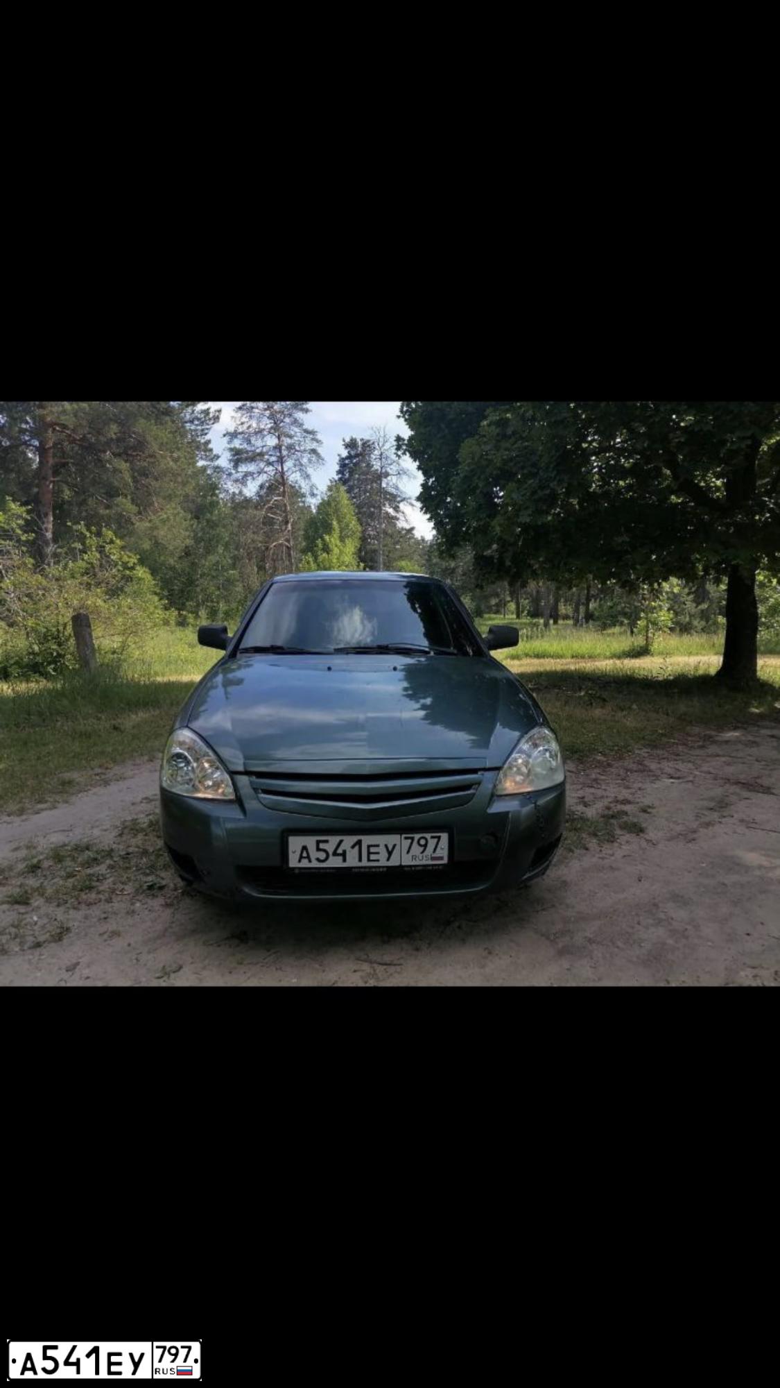 Фото автомобиля LADA 2172 PRIORA, 2009 — госномер Т411МТ790. Цвет: Серо-сине-зеленый