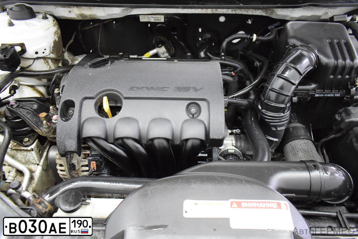 Фото автомобиля KIA CERATO, 2012 — госномер Е212ТА126. Цвет: Белый