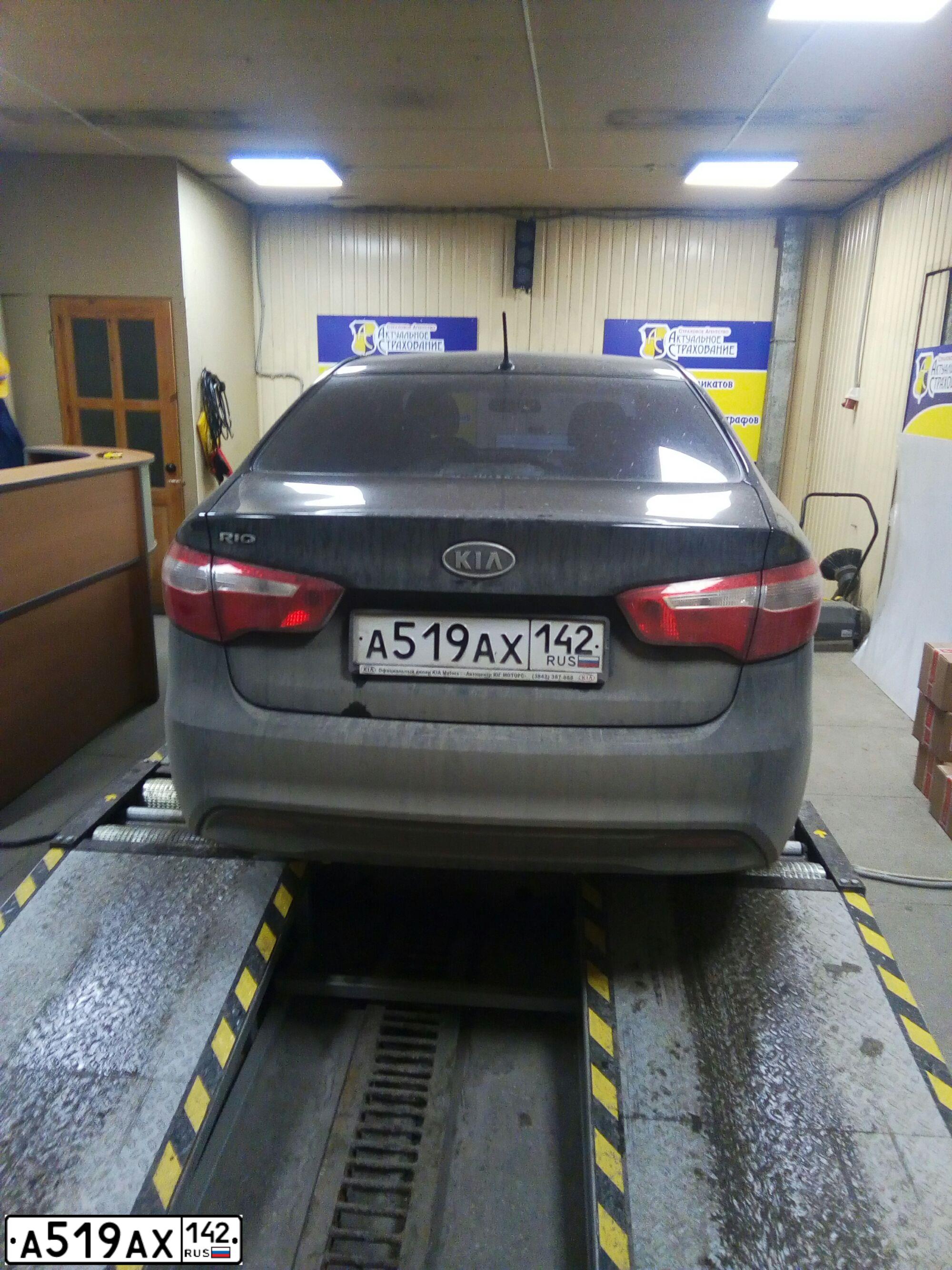 Фото автомобиля KIA RIO, 2012 — госномер А519АХ142. Цвет: ЧЕРНЫЙ