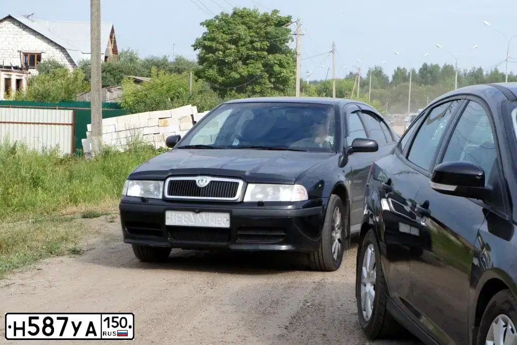 Фото автомобиля SKODA OCTAVIA, 2008 — госномер Е867УТ33. Цвет: ЧЕРНЫЙ