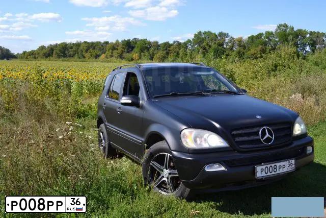Фото автомобиля MITSUBISHI L 200, 2008 — госномер У216ЕР136. Цвет: СЕРЕБРИСТЫЙ