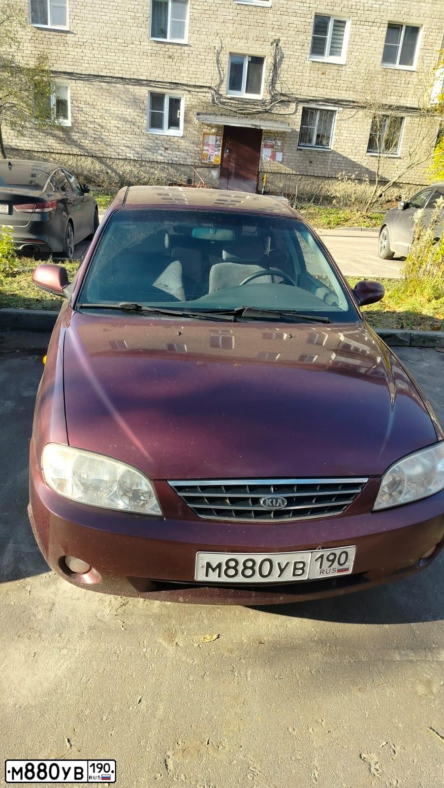 Фото автомобиля KIA SPECTRA, 2006 — госномер Р040АЕ150. Цвет: КРАСНЫЙ