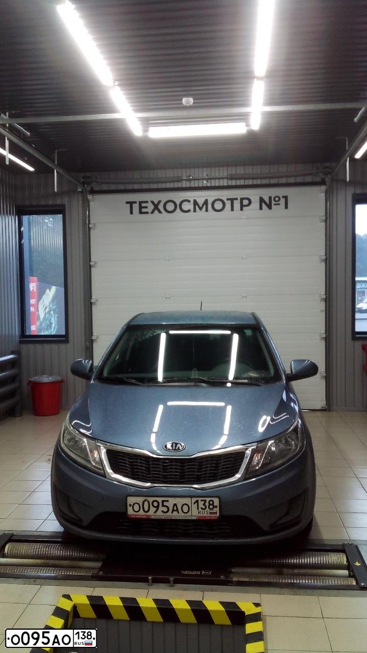 Фото автомобиля KIA RIO, 2014 — госномер С328МА138