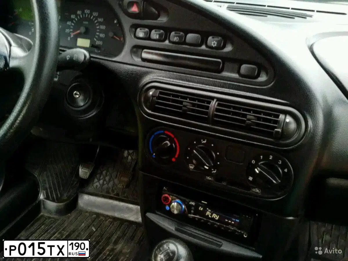 Фото автомобиля CHEVROLET NIVA, 2008 — госномер М023ЕЕ31. Цвет: СЕРО-КОРИЧНЕВЫЙ МЕТАЛЛ