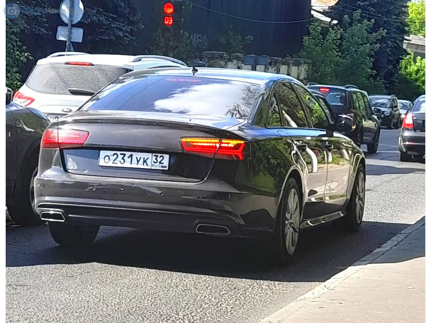 Фото автомобиля AUDI A6, 2016 — госномер О022УС32. Цвет: ЧЕРНЫЙ