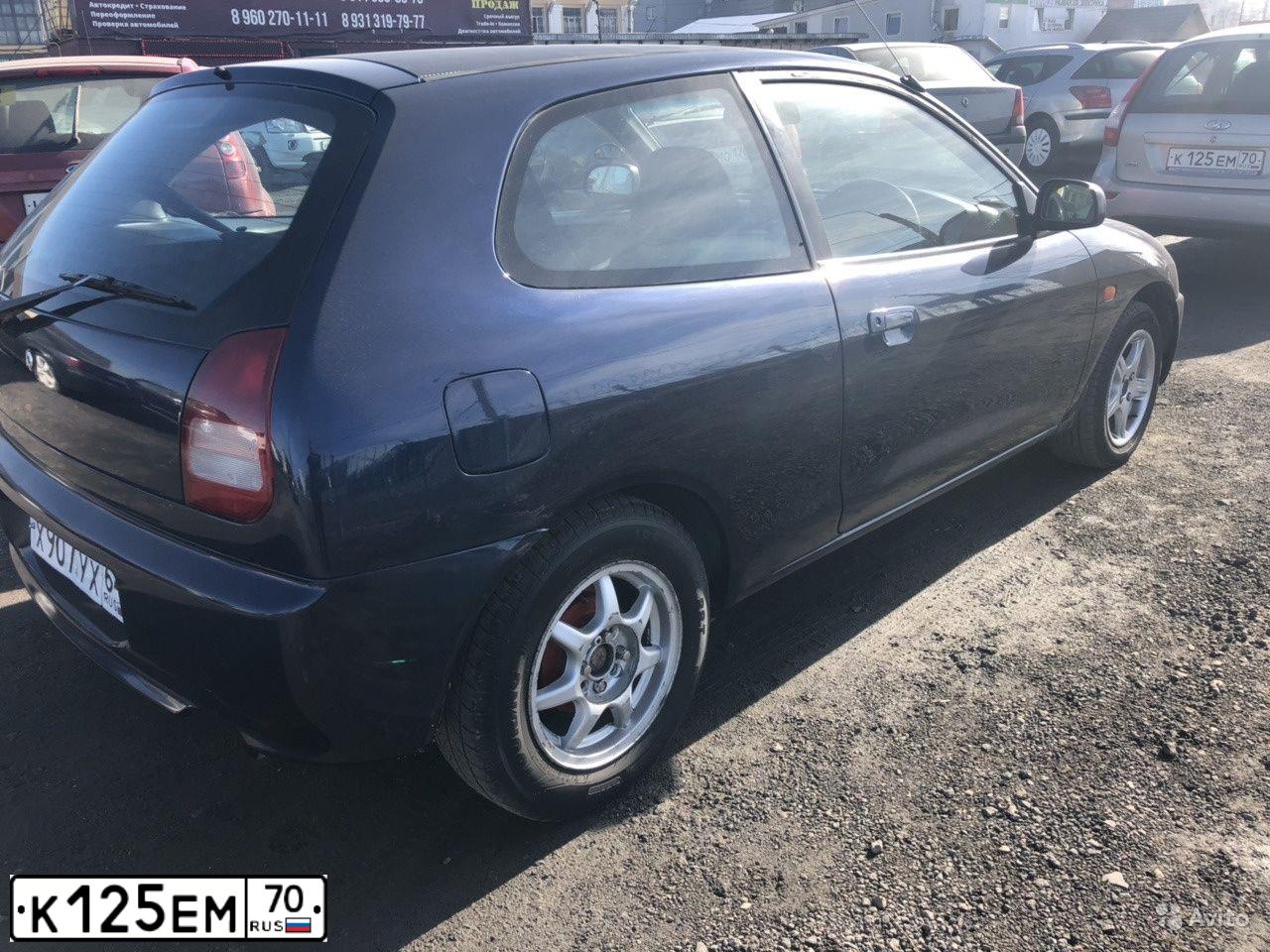 Фото автомобиля LADA 2192 KALINA, 2014 — госномер К125ЕМ70. Цвет: Серый