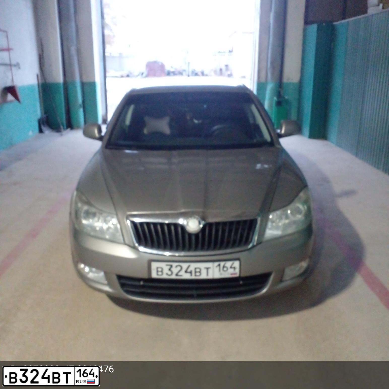 Фото автомобиля SKODA OCTAVIA, 2011 — госномер С162СВ96. Цвет: СЕРЫЙ