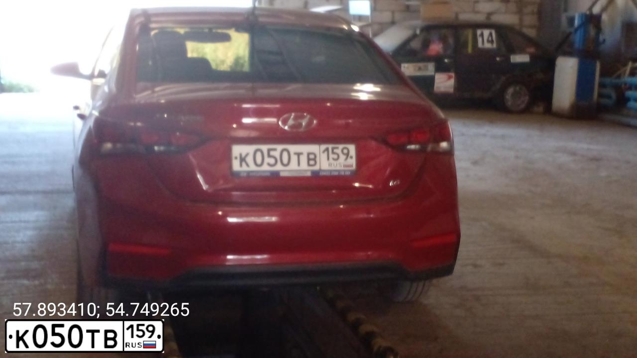 Фото автомобиля HYUNDAI SOLARIS, 2017 — госномер К050ТВ159. Цвет: КРАСНЫЙ