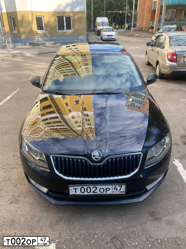 Фото автомобиля SKODA OCTAVIA, 2014 — госномер Т002ОР47. Цвет: ЧЕРНЫЙ