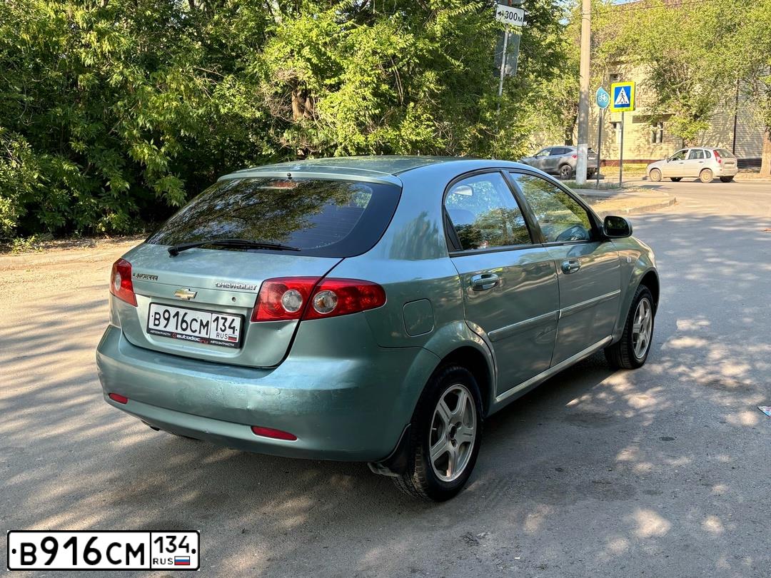 Фото автомобиля CHEVROLET LACETTI, 2006 — госномер В916СМ134. Цвет: ЗЕЛЕНЫЙ