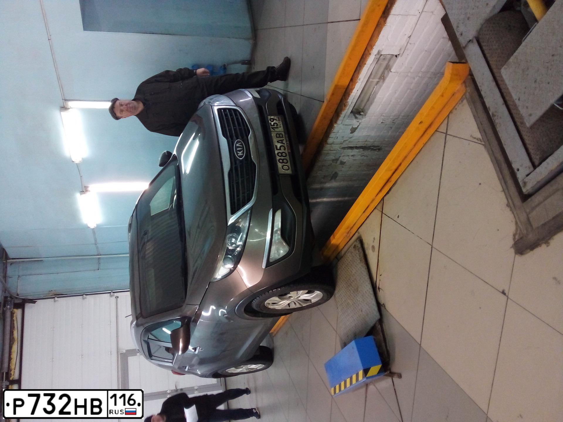 Фото автомобиля KIA SPORTAGE, 2012 — госномер О196ОА45. Цвет: Коричневый
