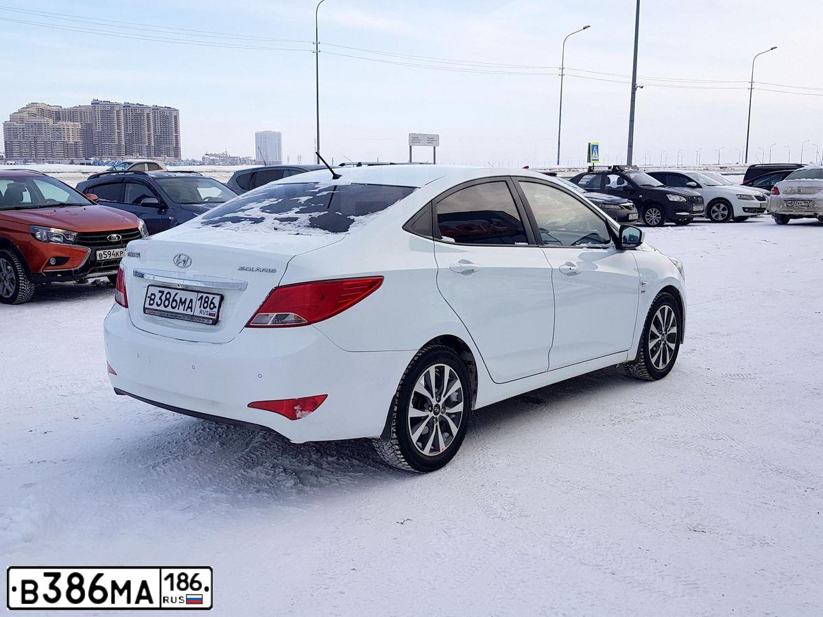 Фото автомобиля HYUNDAI SOLARIS, 2014 — госномер М111АУ186. Цвет: Белый
