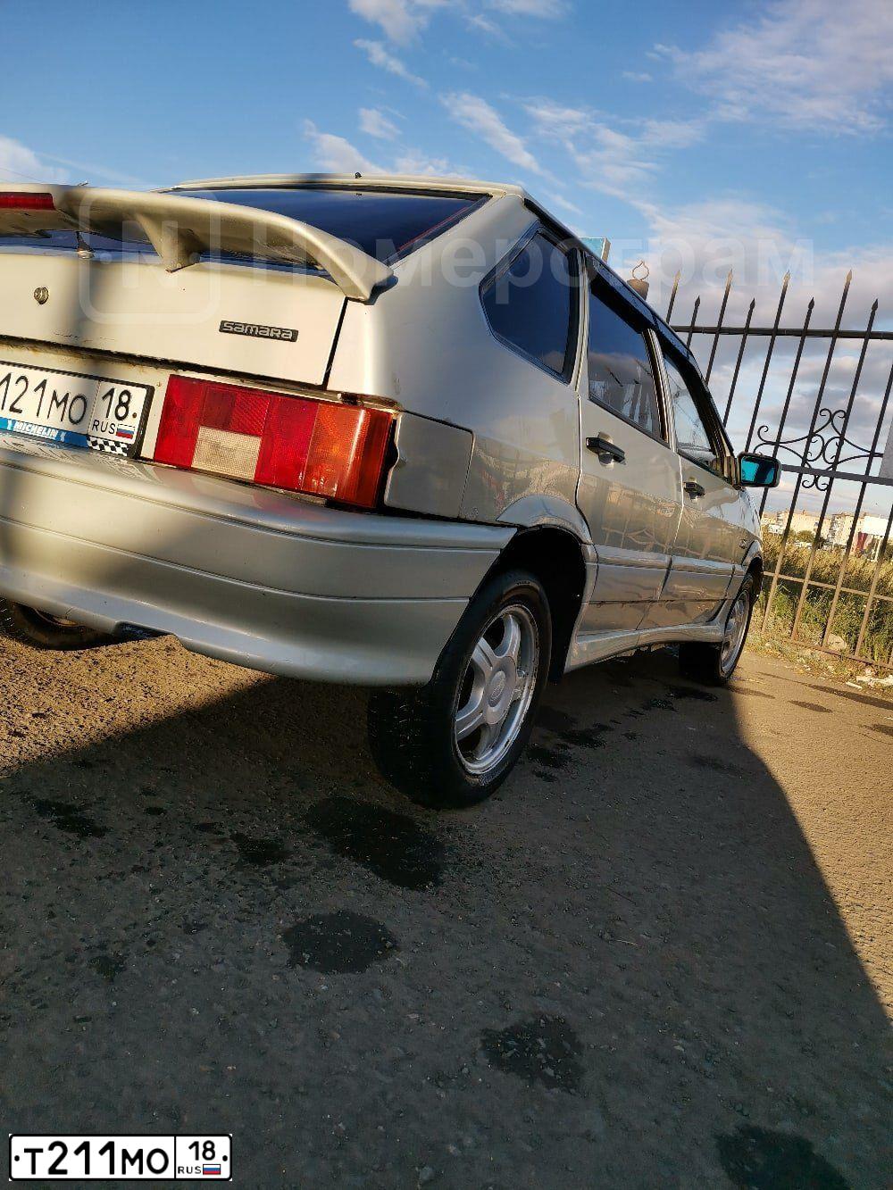 Фото автомобиля LADA 2170 PRIORA, 2011 — госномер Т211МО18. Цвет: СРЕДНИЙ СЕРО-ЗЕЛЕНЫЙ МЕТАЛЛ