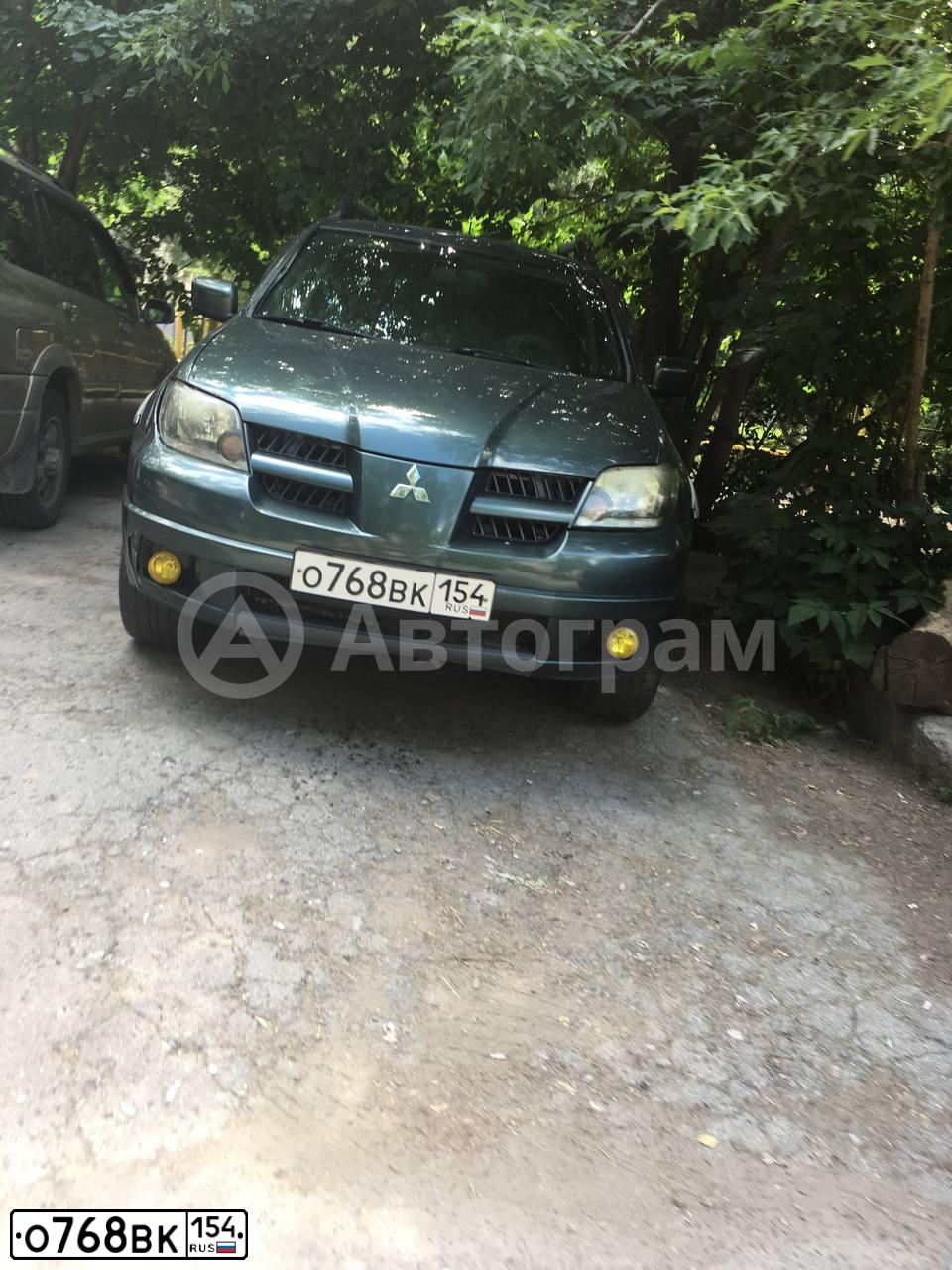 Фото автомобиля MITSUBISHI OUTLANDER, 2004 — госномер М300КН55. Цвет: ЗЕЛЕНЫЙ