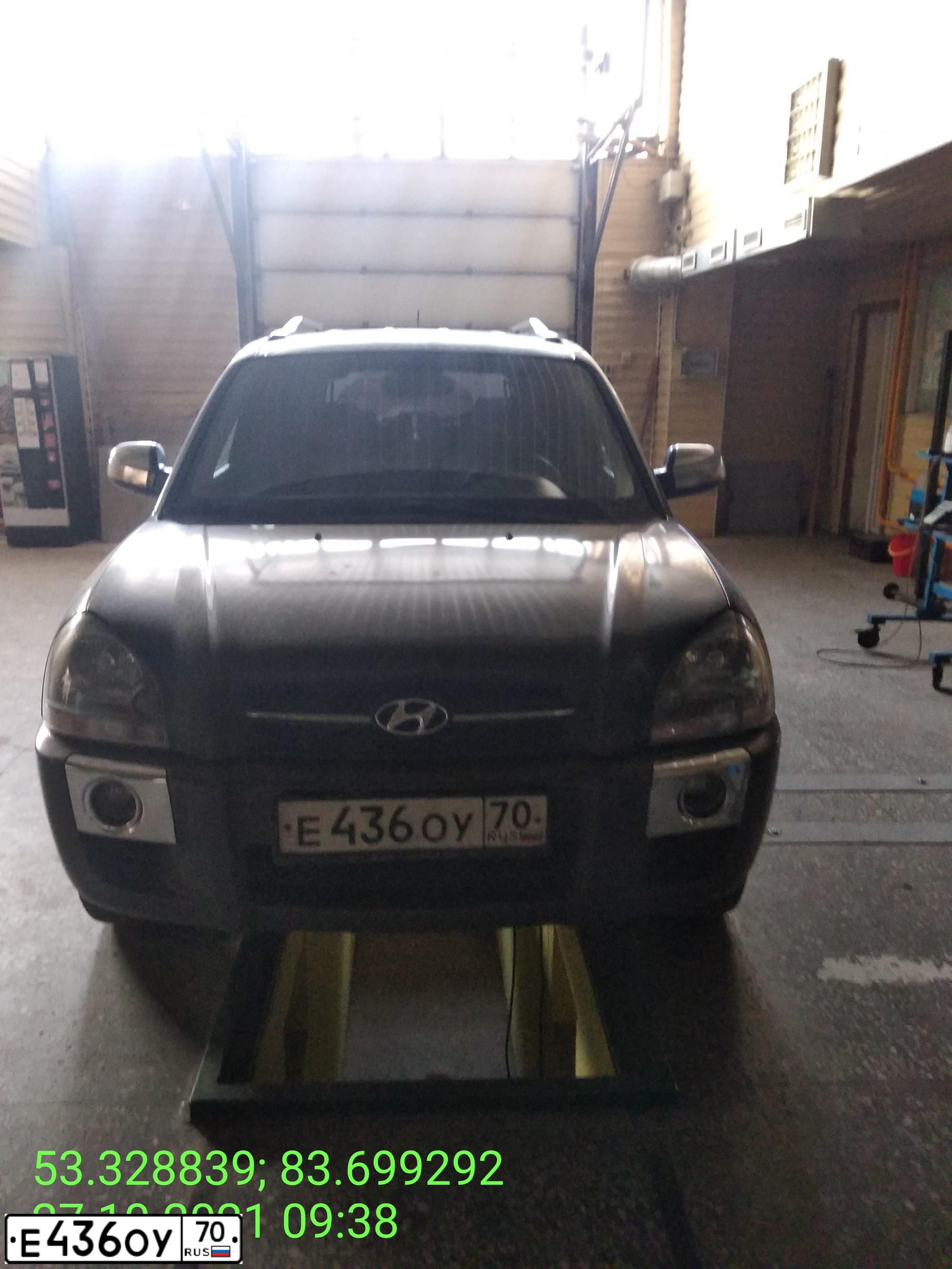 Фото автомобиля HYUNDAI TUCSON, 2007 — госномер Е436ОУ70. Цвет: Темно-зеленый