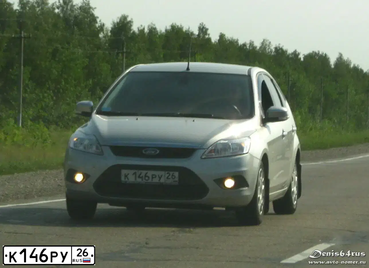 Фото автомобиля FORD FOCUS, 2009 — госномер Х053ЕО55. Цвет: Серебристый
