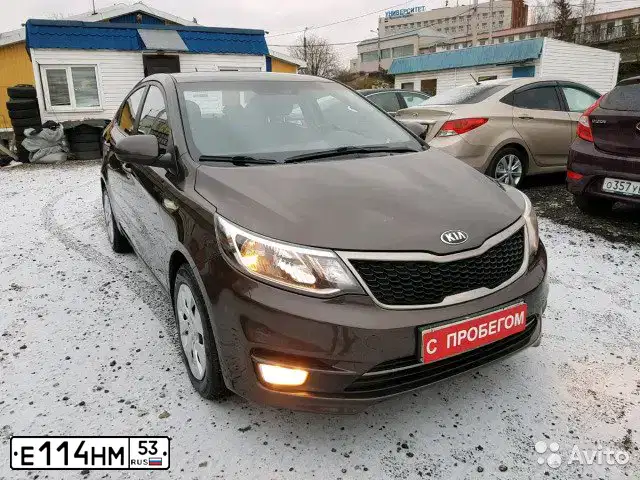 Фото автомобиля KIA CERATO, 2012 — госномер Е114НМ53. Цвет: Белый
