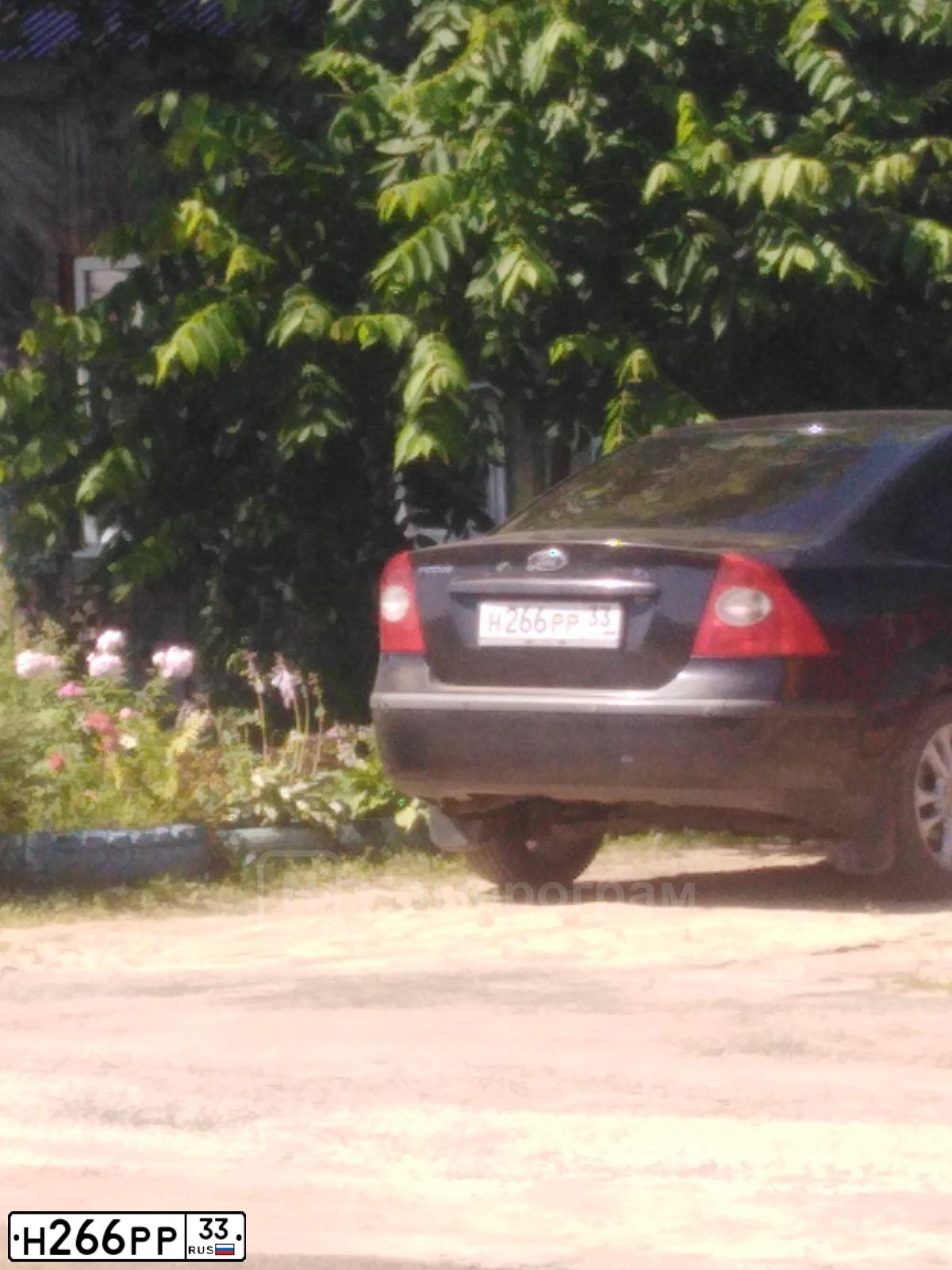 Фото автомобиля FORD FOCUS, 2008 — госномер Н266РР33. Цвет: ЧЕРНЫЙ