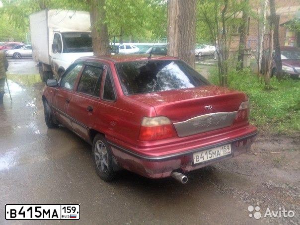 Фото автомобиля DAEWOO NEXIA, 2006 — госномер А596ТС159. Цвет: Красный