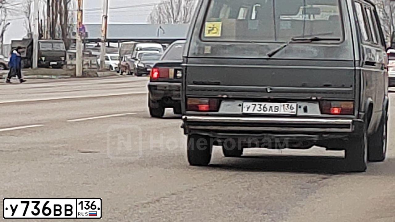 Фото автомобиля KIA SPORTAGE, 2012 — госномер У736ВВ136. Цвет: БЕЛЫЙ